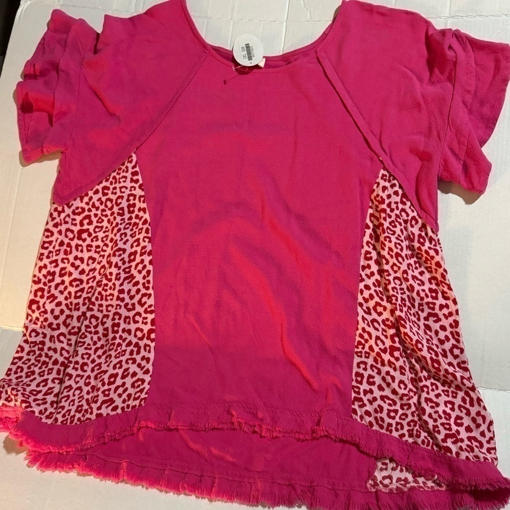 Pink leopard print top.